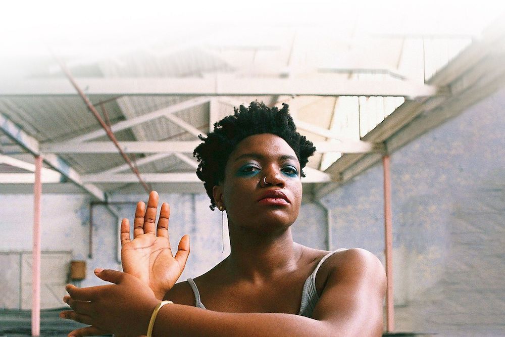 African American Woman posing directly at the camera