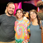 Three people posing together and smiling at the MGFF24 Program Launch Party.