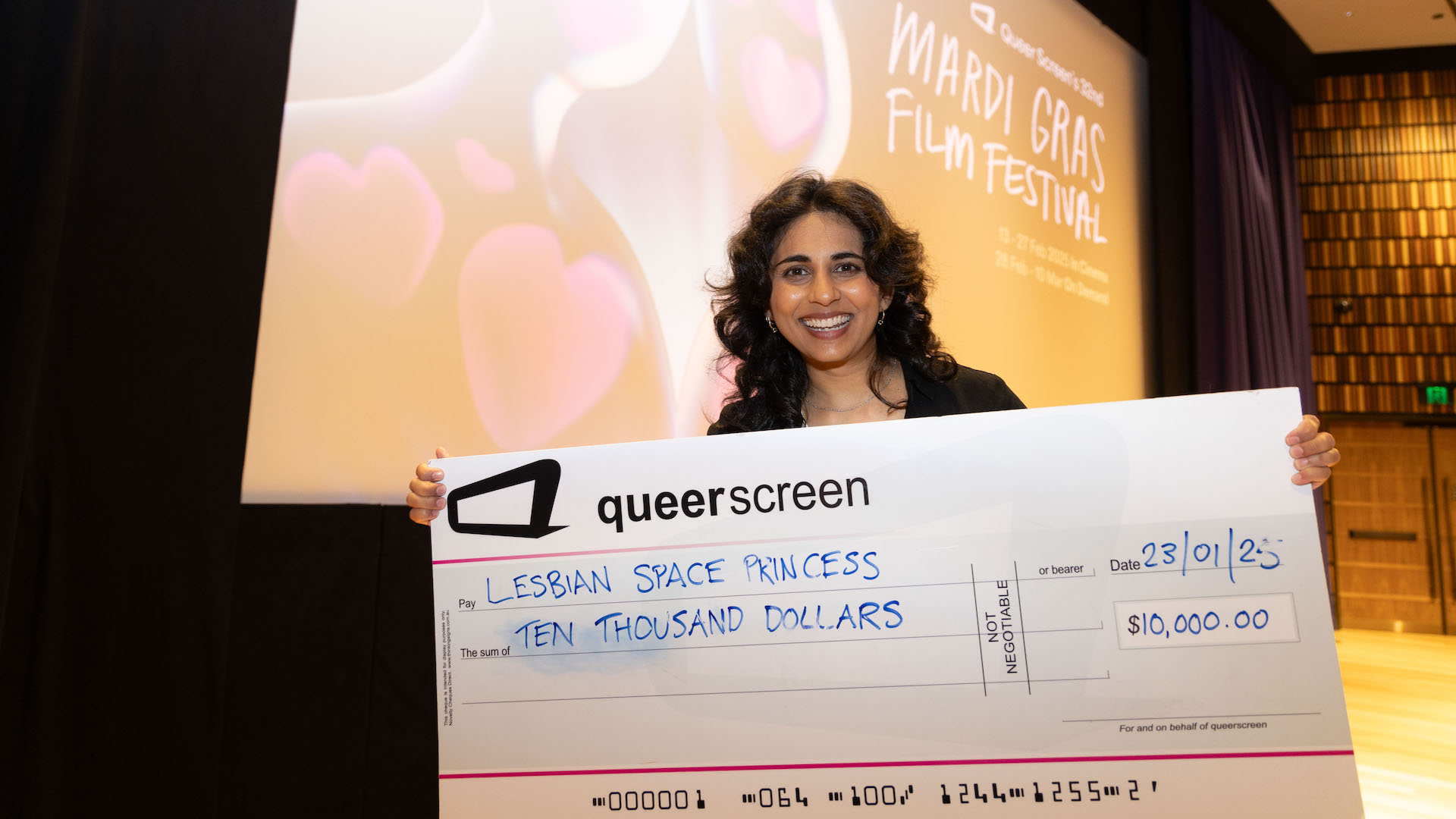 Leela Varghese with her winning cheque at the MGFF25 Program Launch